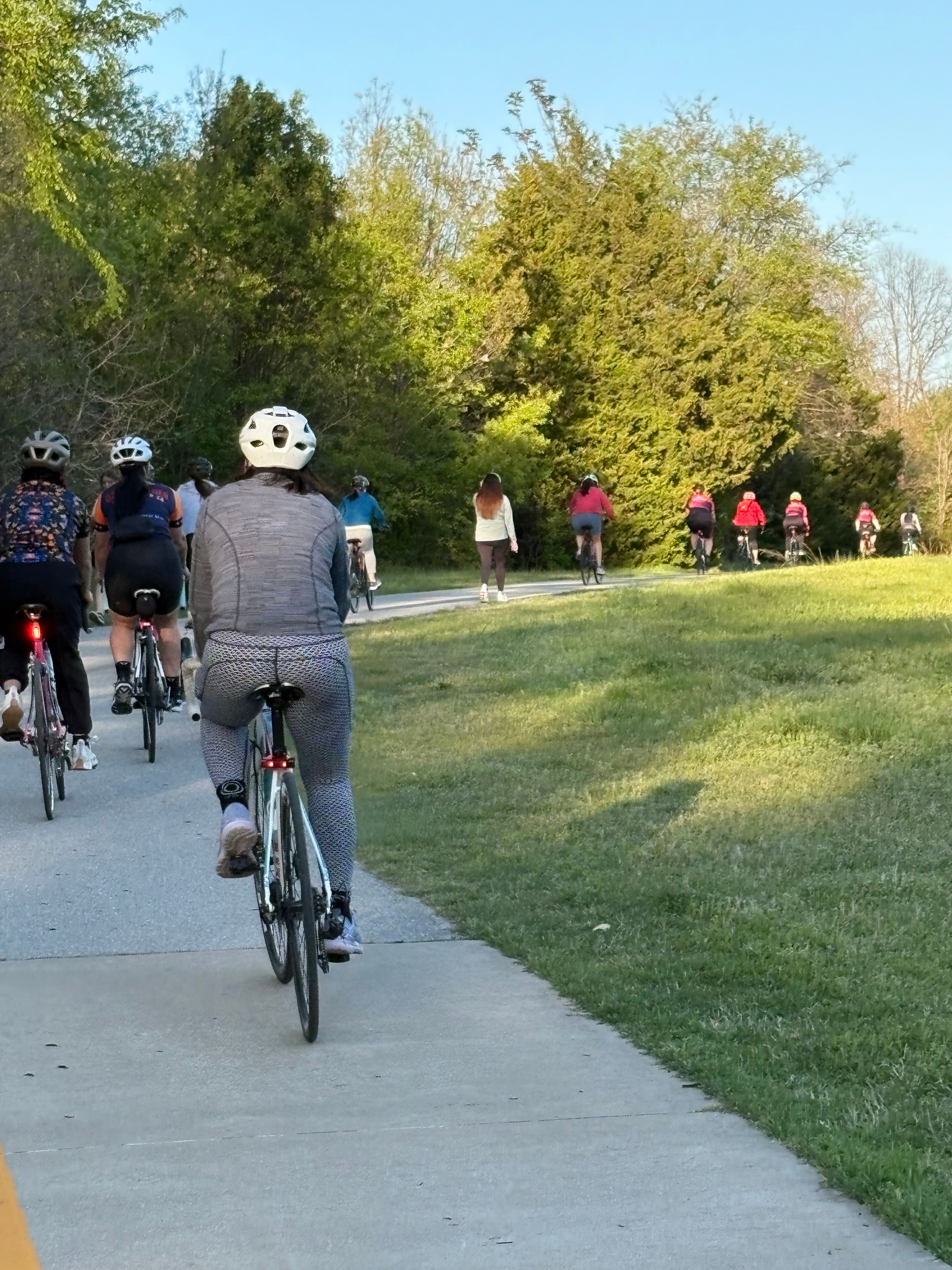Scenic Latinas en Bici group ride on the Razorback Greenway, showing the beautiful cycling opportunities we create for our community